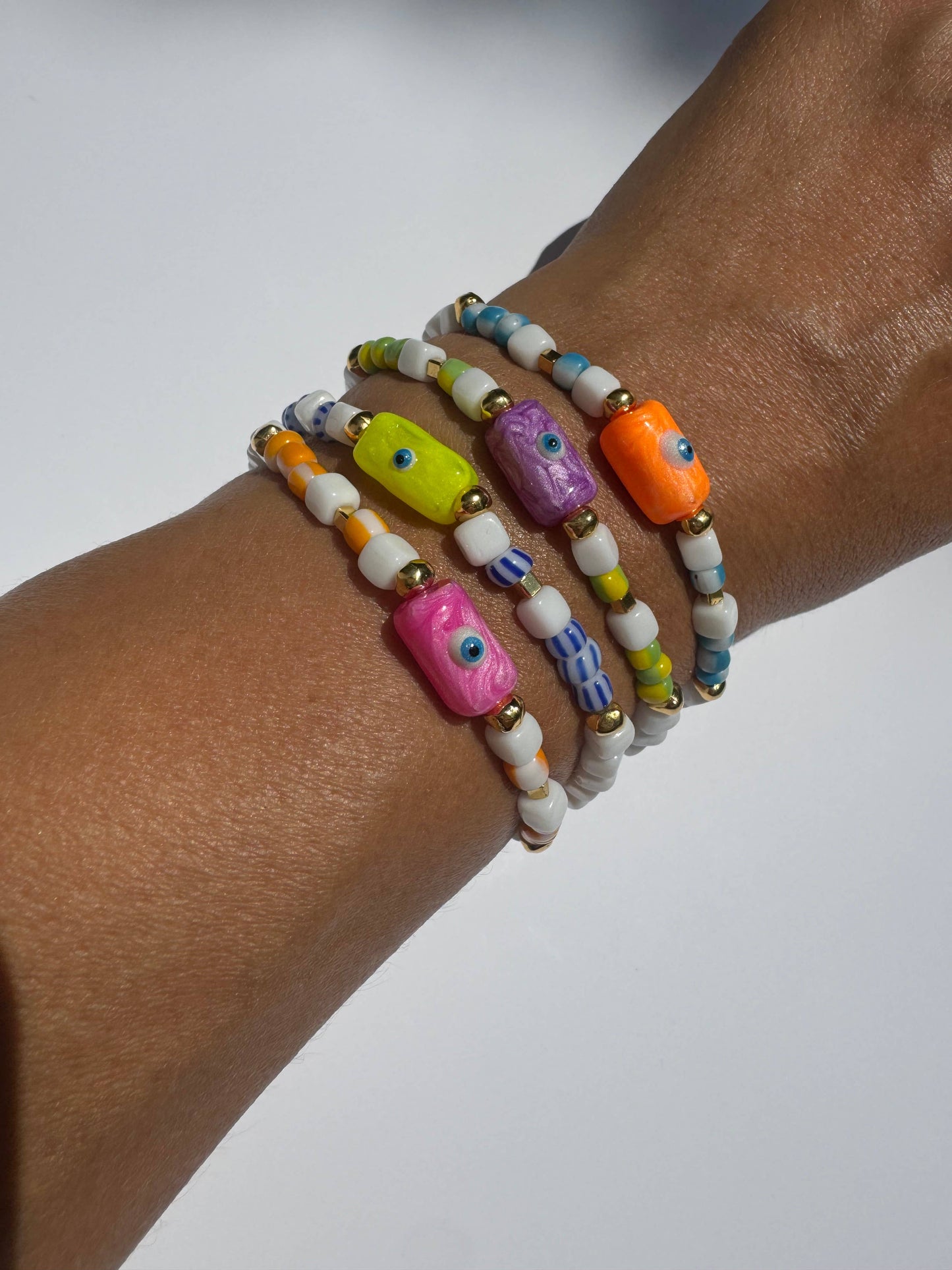 Pink Evil Eye Bracelet (glass beads, acrylic evil eye, & metal beads)
