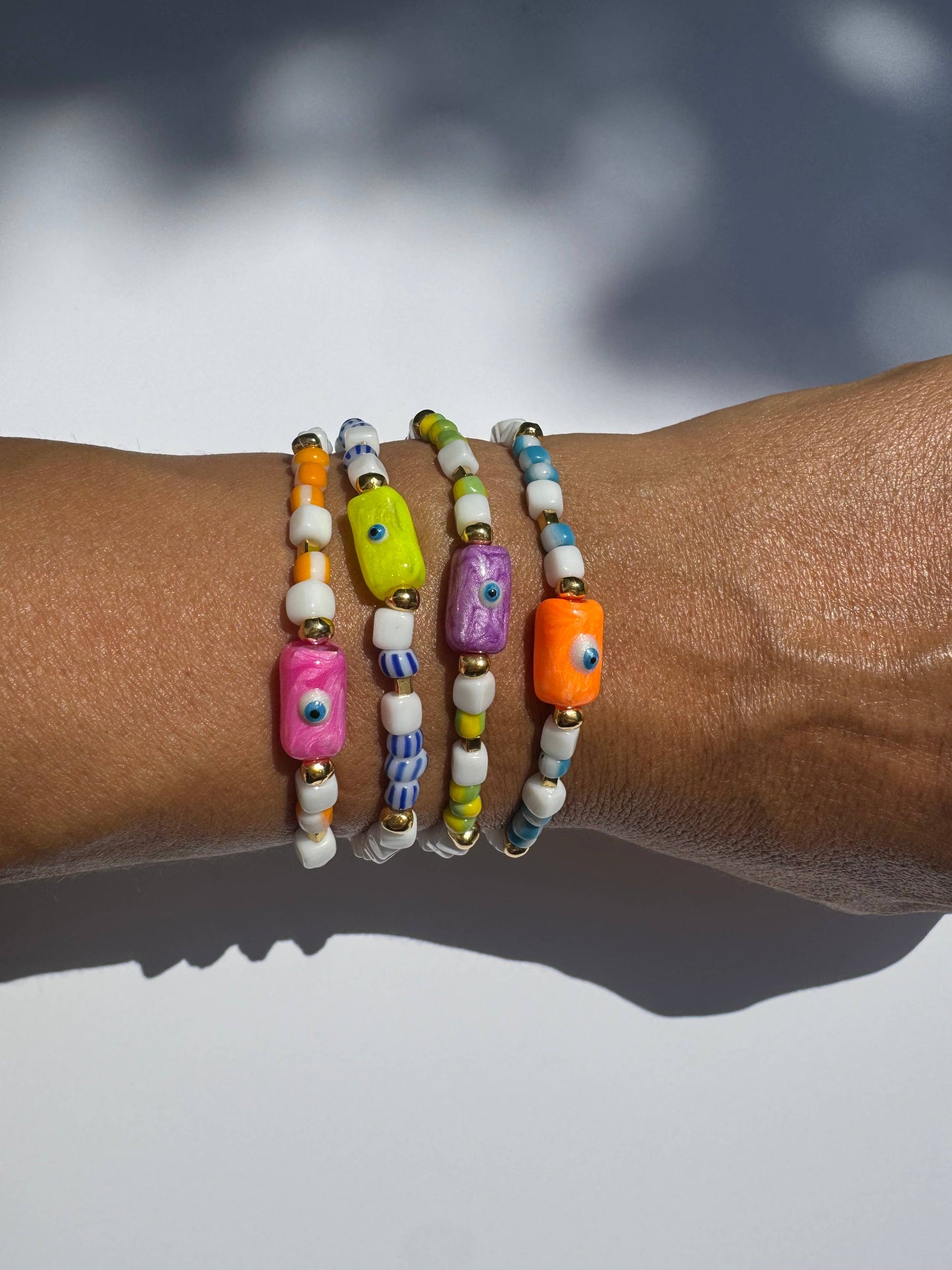 Pink Evil Eye Bracelet (glass beads, acrylic evil eye, & metal beads)