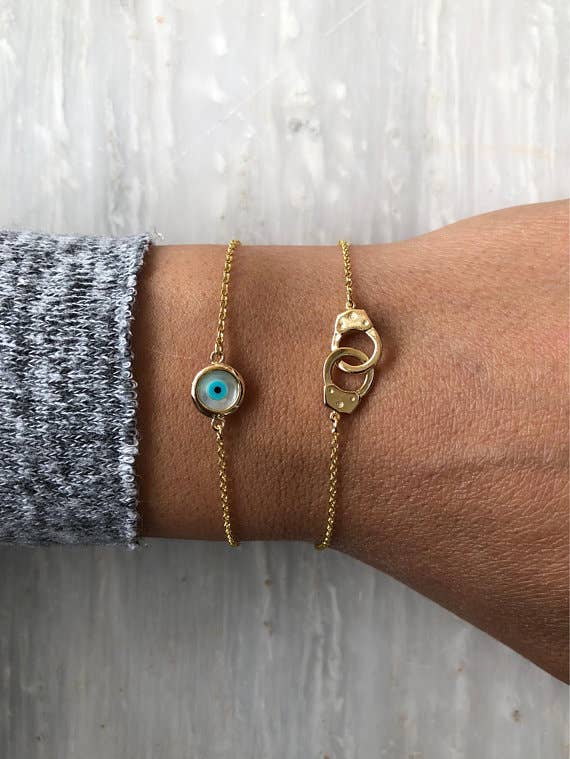 Tiny Evil Eye Bracelet (.925 sterling silver, 24k plating, & enamel)