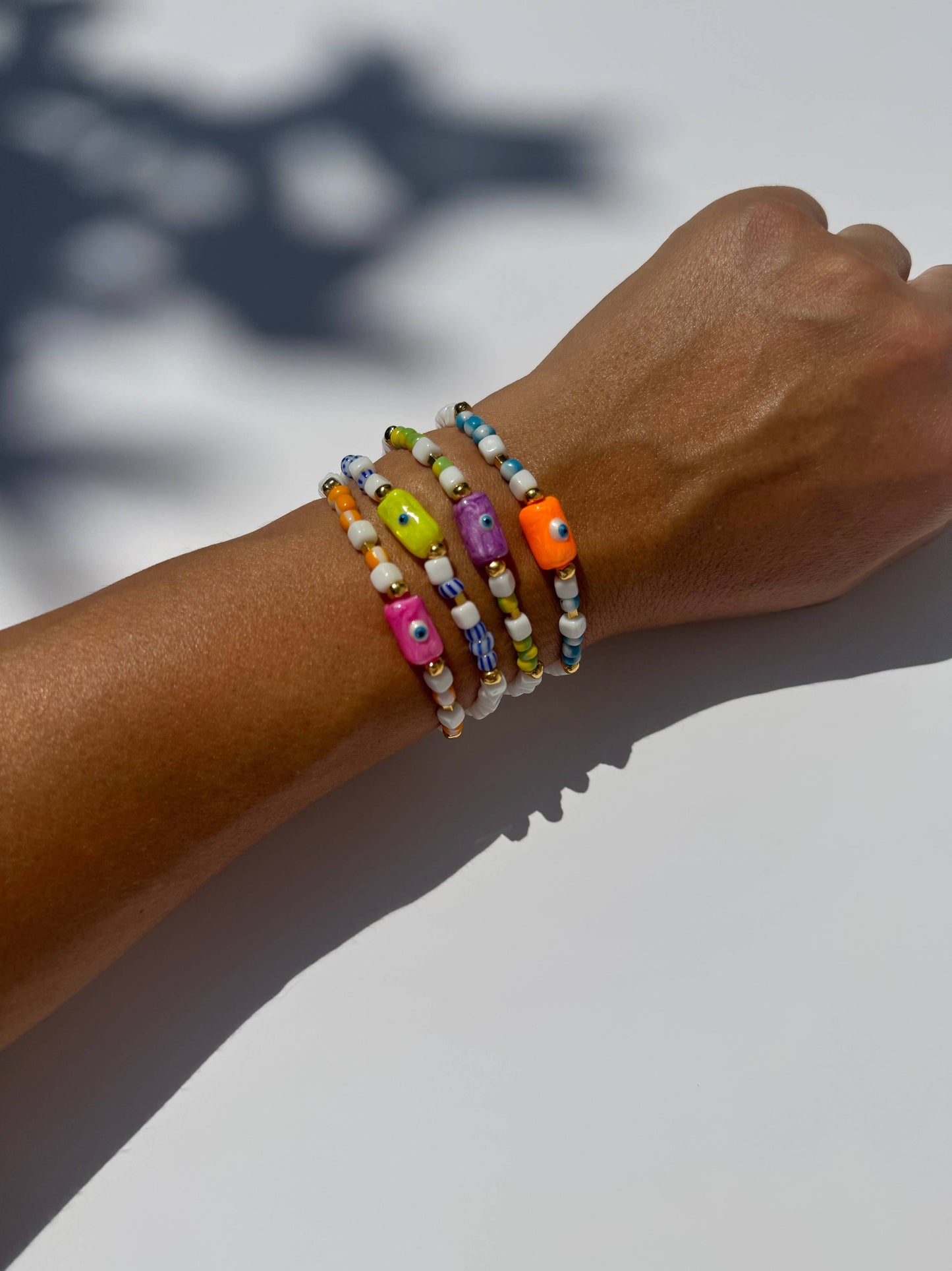 Pink Evil Eye Bracelet (glass beads, acrylic evil eye, & metal beads)