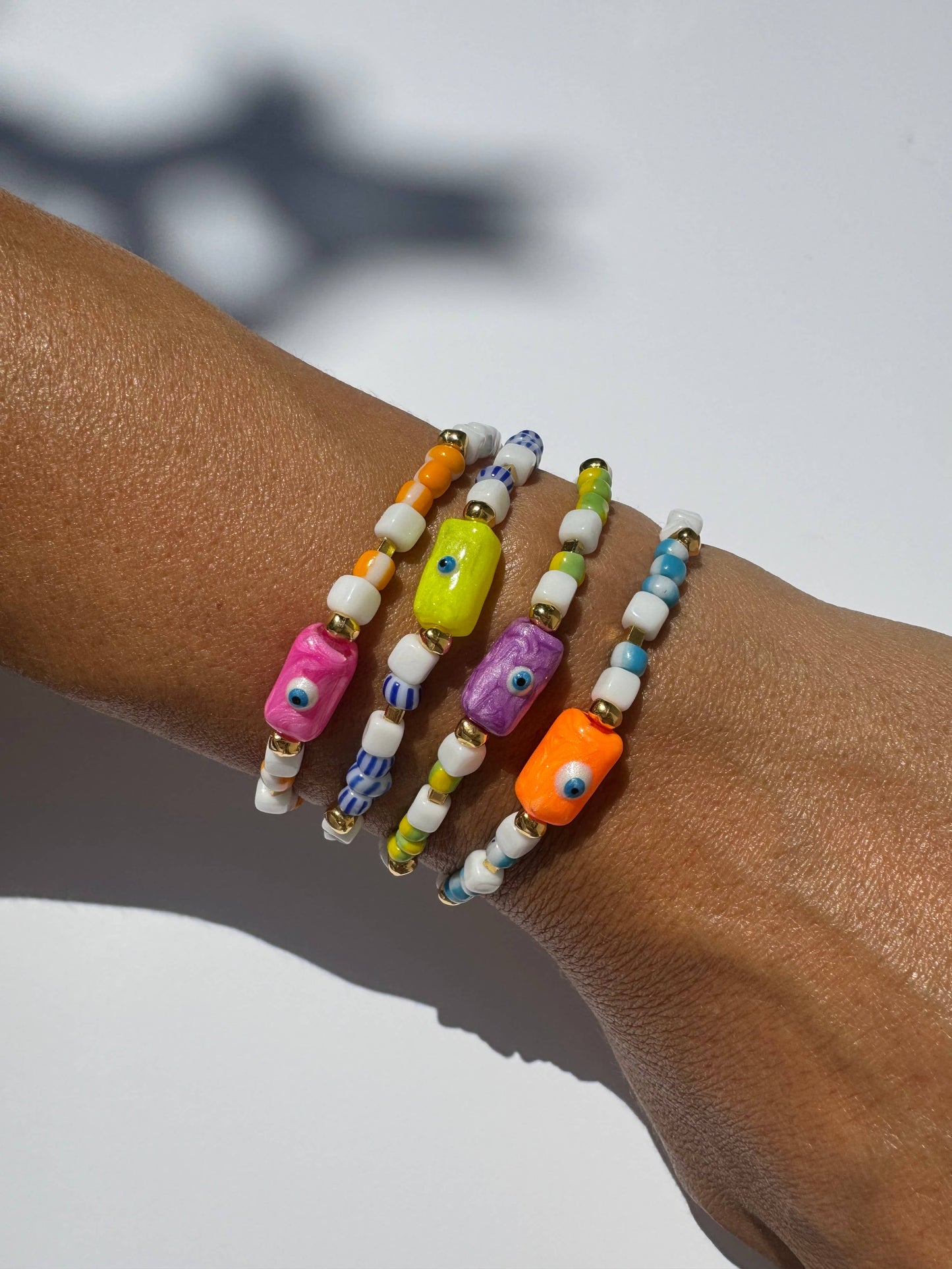 Pink Evil Eye Bracelet (glass beads, acrylic evil eye, & metal beads)